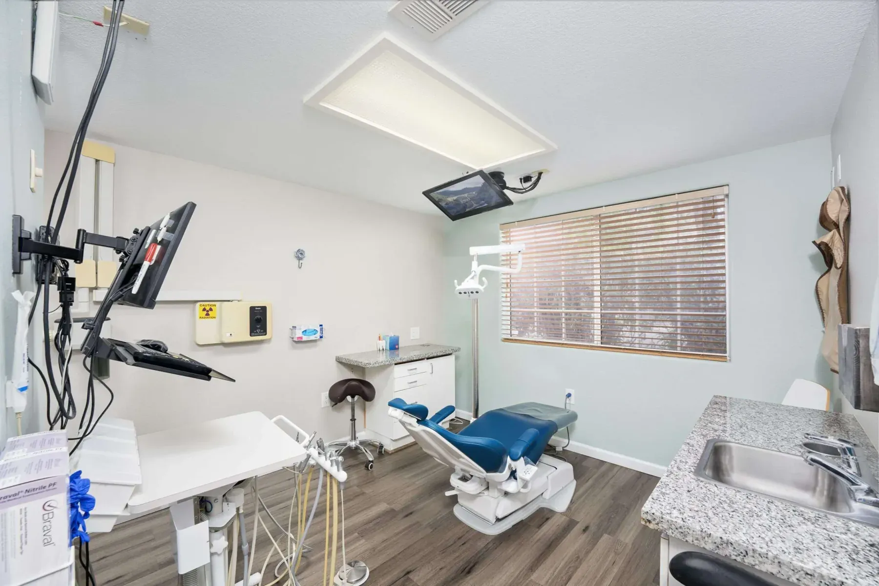 A treatment room with a chairside computer at Alta Vista Dental Care